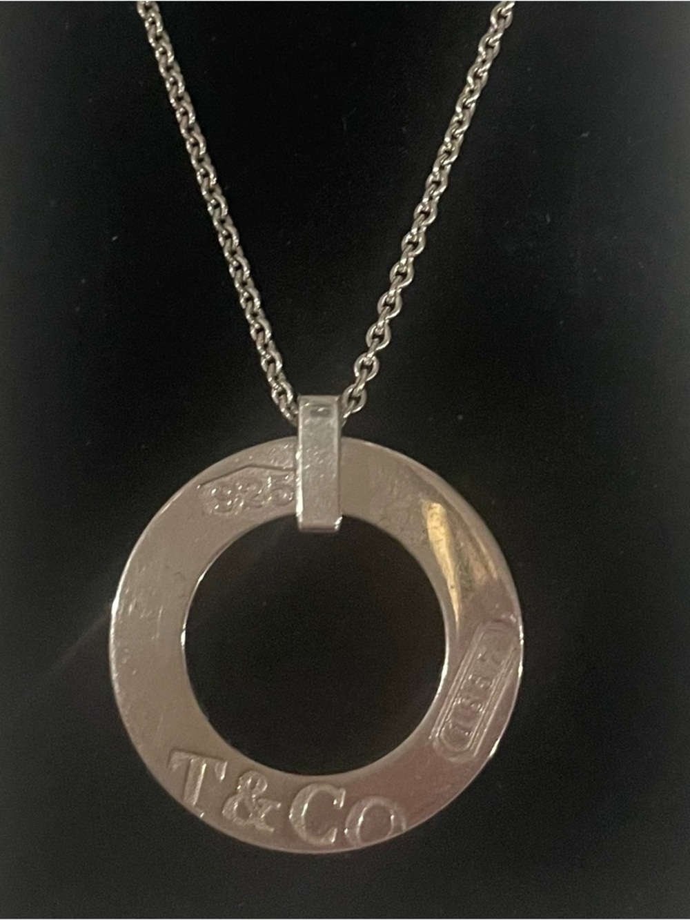 Tiffany &Co. sold sterling silver round pendant